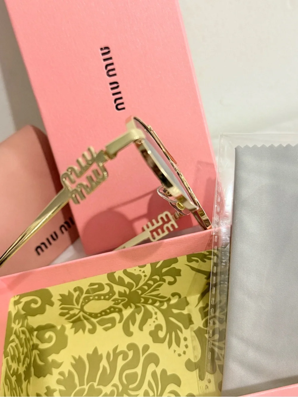 Miu Miu Gold Frame Black Lens Sunglasses with Pink Case
